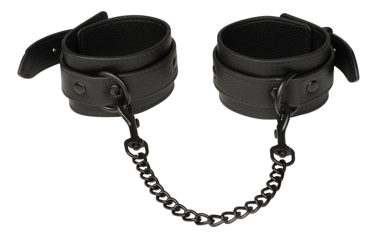 Handledsmanschetter i konstläder